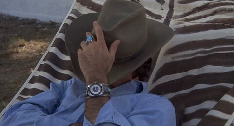 Burt Reynolds as Bo "Bandit" Darville with the Timex (unidentified model) in Smokey and the Bandit (1977)