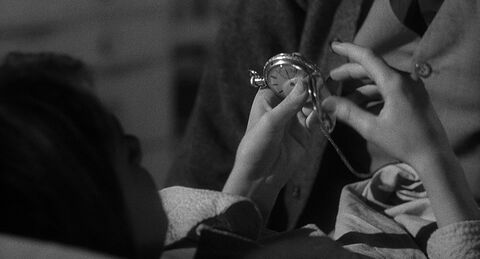 Gregory Peck as Atticus Finch with the Unidentified pocket watch in To Kill a Mockingbird (1962)