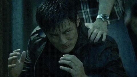 Shawn Yue as young Chan Wing-yan with the Rolex Submariner in Infernal Affairs II (2003)