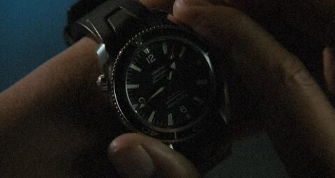 Anthony Wong Chau-sang as Lo with the Omega Seamaster Planet Ocean in Motorway (2012)