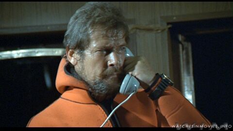 Roger Moore as Rufus Excalibur ffolkes with the Seiko 7549-7009 in North Sea Hijack (1980)