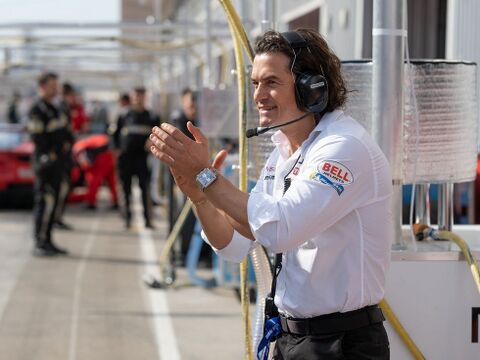 Orlando Bloom as Danny Moore with the TAG Heuer Monaco CBL2111.BA0644 in Gran Turismo (2023)