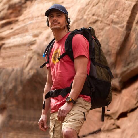 James Franco as Aron Ralston with the Suunto Vector in 127 Hours (2010)