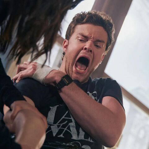 Jack Quaid as Hughie Campbell with the Casio CA-53W-1 in The Boys (2019)