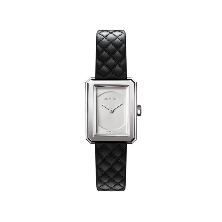 A rectangular Chanel Boy·Friend has a pale dial and a black quilted strap.