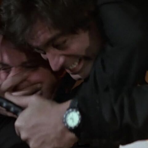 Timothy Dalton as James Bond with the TAG Heuer Professional Night-Dive 980.031 in The Living Daylights (1987)