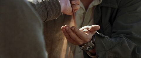 Leonardo DiCaprio as Danny Archer with the Breitling Chrono Avenger in Blood Diamond (2006)