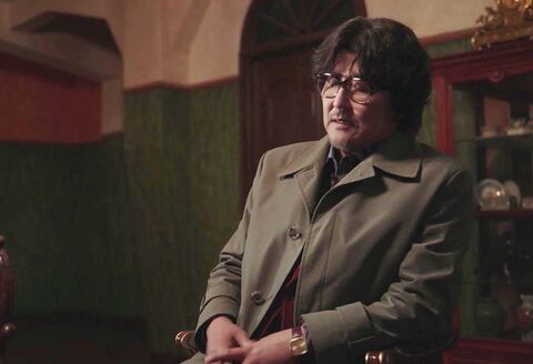 Song Kang-ho as Kim Yeol with the Omega Genève in Cobweb (2023)