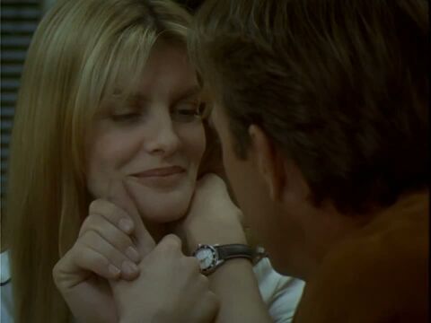 Rene Russo as Dr. Molly Griswold with the Hamilton Khaki Sub Medium in Tin Cup (1996)