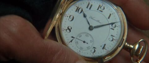 Anthony Hopkins as Charles Morse with the Hamilton Broadway Ltd. pocket watch in The Edge (1997)