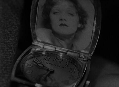 Clive Brook as Captain Donald "Doc" Harvey with the Hamilton Flintridge in Shanghai Express (1932)