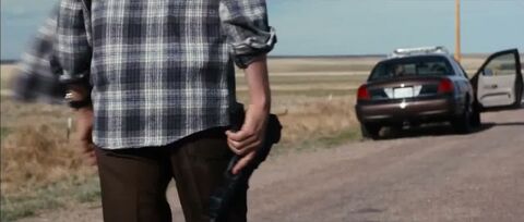 Kevin Bacon as Sheriff Kretzer with the Pulsar PF3293 in Cop Car (2015)