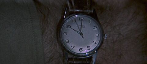 Gregory Peck as Captain Keith Mallory with the Gruen Precision in The Guns of Navarone (1961)