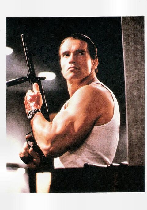 Arnold Schwarzenegger as Mark Kaminsky with the Seiko H558-5000 in Raw Deal (1986)