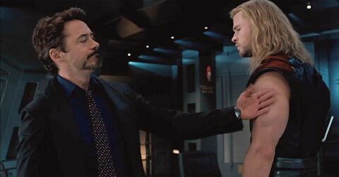 Robert Downey Jr. as Tony Stark / Iron Man with the Hamilton Khaki Field Titanium Auto in The Avengers (2012)