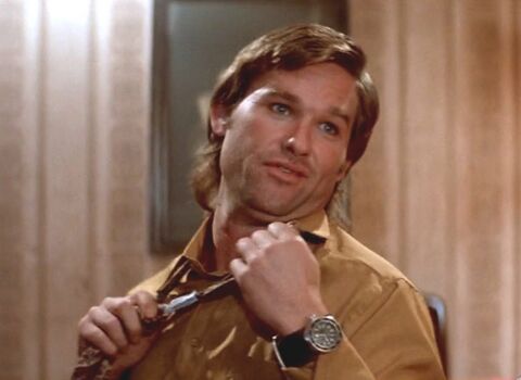 Kurt Russell as Jack Burton with the Aquastar Benthos in Big Trouble in Little China (1986)