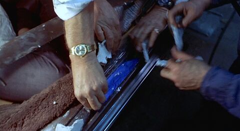 Gene Hackman as Jimmy "Popeye" Doyle with the Timex Marlin in The French Connection (1971)