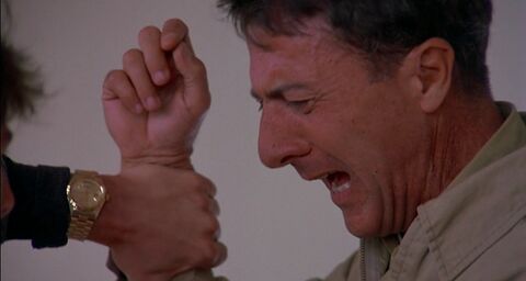 Tom Cruise as Charlie Babbitt with the Rolex Day-Date in Rain Man (1988)