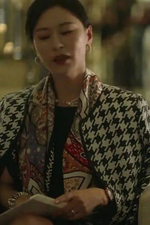 The wearer as Madame Wang with the Breguet Reine de Naples 8918BR in Nothing But Thirty (2020)