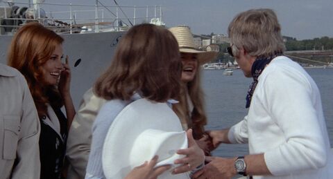 James Coburn as Clinton Greene with the Omega Speedmaster Professional Mark II in The Last of Sheila (1973)