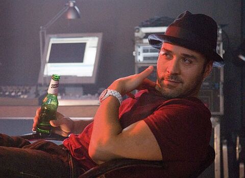 Jeremy Piven as Roman with the Chanel J12 (white ceramic) in RocknRolla (2008)