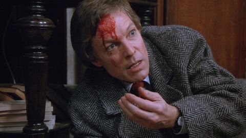 Richard Chamberlain as Jason Bourne with the Swatch watch in The Bourne Identity (1988)