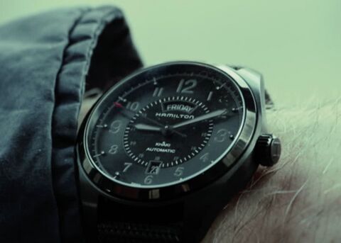 Anson Mount as The Virtuoso with the Hamilton Khaki Field Day Date Auto in The Virtuoso (2021)