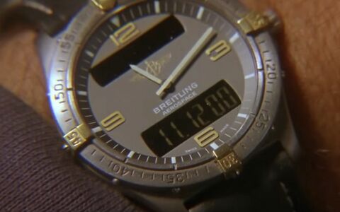 John Travolta as Major Vic Deakins with the Breitling Aerospace in Broken Arrow (1996)