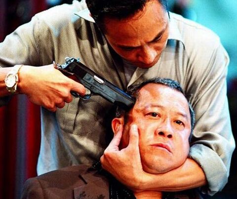 Francis Ng as Ngai Wing-hau with the Rolex Day-Date in Infernal Affairs II (2003)
