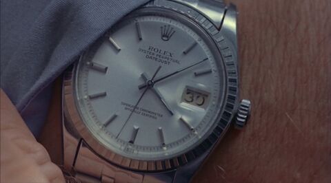 Robert Mitchum as Philip Marlowe with the Rolex Datejust in The Big Sleep (1978)