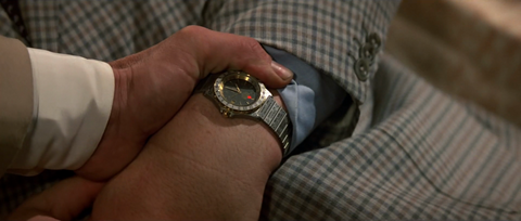 John Rhys-Davies as General Leonid Pushkin with the Heuer Airline GMT in The Living Daylights (1987)