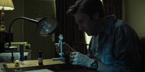 Jason Butler Harner as Roy Petty with the Timex Weekender in Ozark (2017)