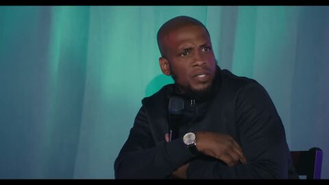 Ali Siddiq as Himself with the Bulova American Clipper in The Domino Effect (2022)