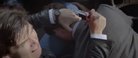 Pierce Brosnan as Valeri Petrofsky with the TAG Heuer 1000 Professional 980.026L in The Fourth Protocol (1987)