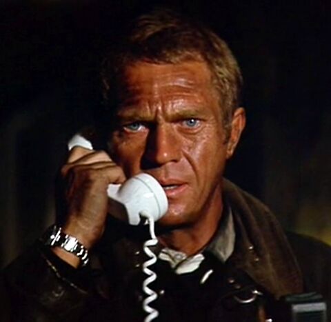 Steve McQueen as Michael O'Hallorhan with the Rolex Submariner in The Towering Inferno (1974)