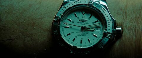 John Travolta as Ryder with the Breitling Aeromarine Colt II Automatic in The Taking of Pelham 123 (2009)