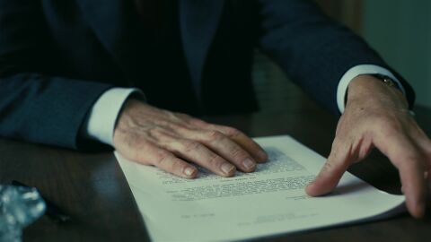Cillian Murphy as J. Robert Oppenheimer with the Hamilton Cushion B in Oppenheimer (2023)